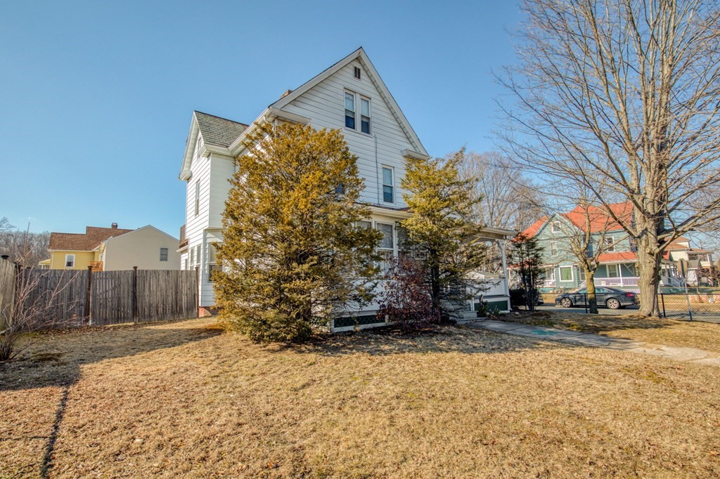 2129 Northampton Street Holyoke, MA 01040 - Photo 2 of 25 a front view of a house with a yard