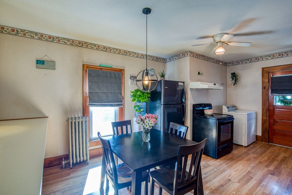 2129 Northampton Street Holyoke, MA 01040 - Photo 4 of 25 a view of a dining room with furniture window and wooden floor
