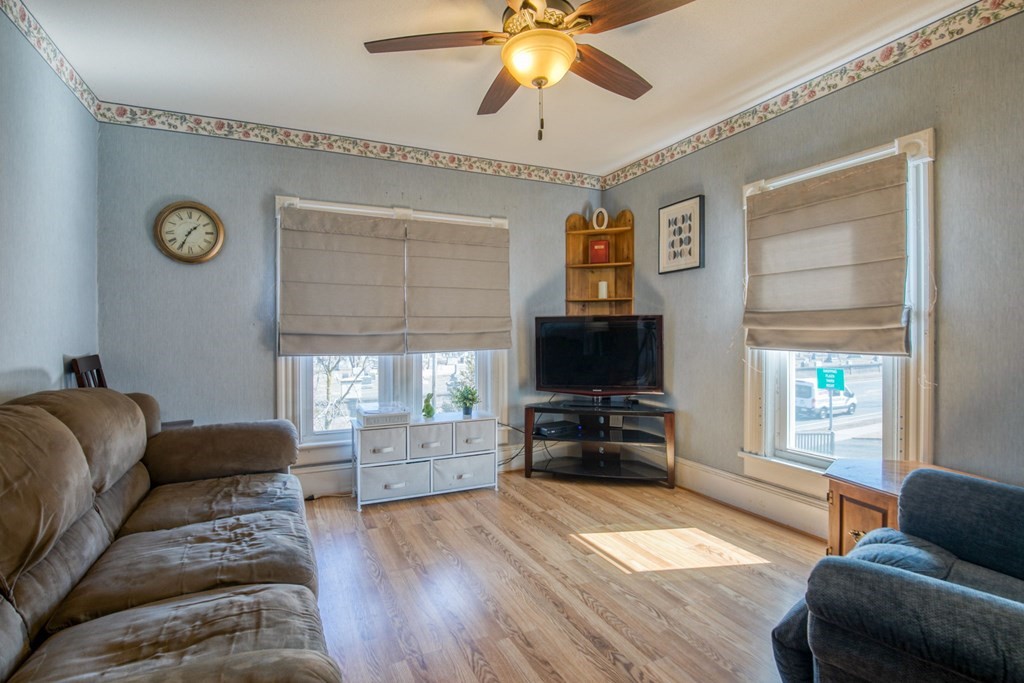 2129 Northampton Street Holyoke, MA 01040 - Photo 9 of 25 a living room with furniture and a flat screen tv