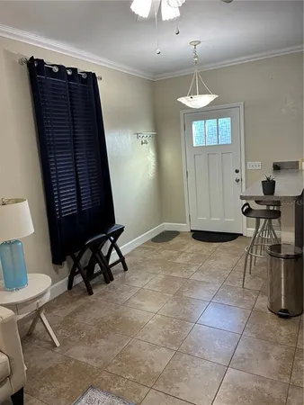 a view of entryway with wooden floor