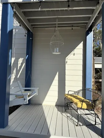 a view of sitting area with wooden floor