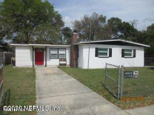 7655 Falcon Street Jacksonville, FL 32244 - Photo 1 of 13 a view of a house with a yard