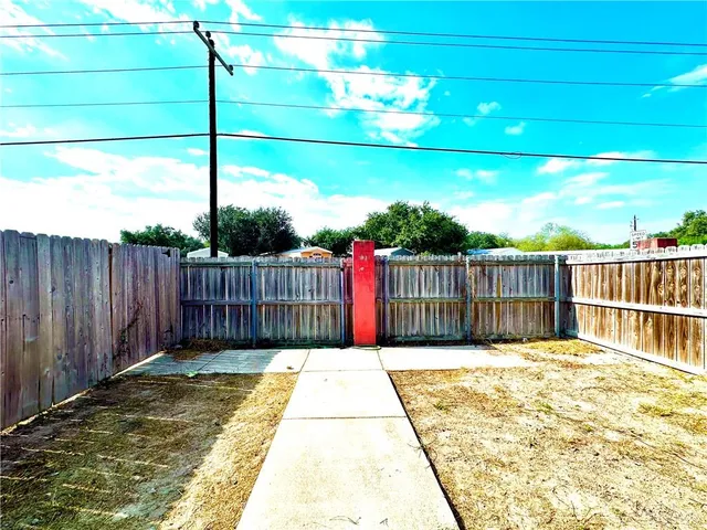 a kitchen with stainless steel appliances a refrigerator sink and cabinets