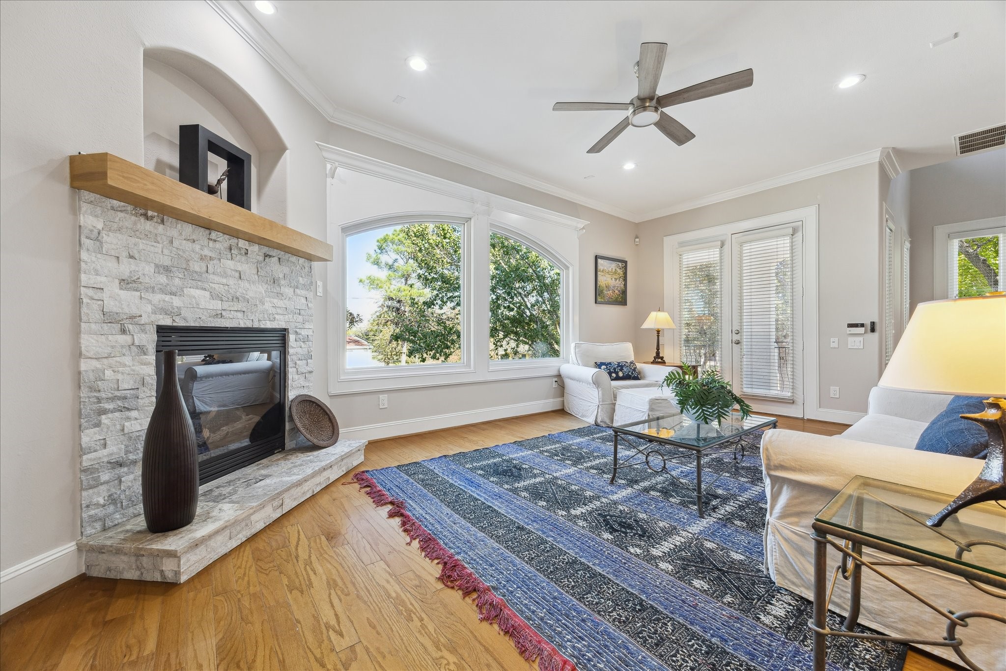4701 Inker Street Houston, TX 77007 - Photo 12 of 45 a living room with furniture and a fireplace