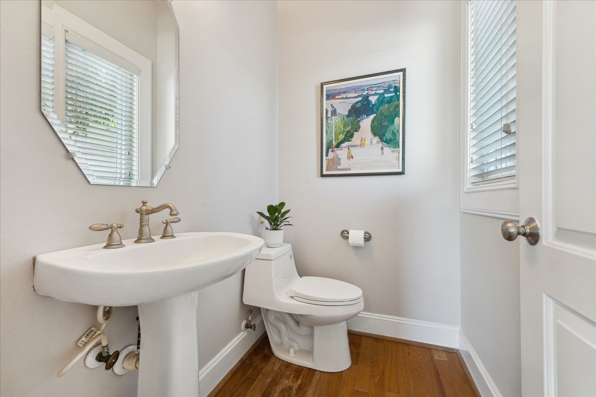 4701 Inker Street Houston, TX 77007 - Photo 13 of 45 a bathroom with a sink toilet and a mirror