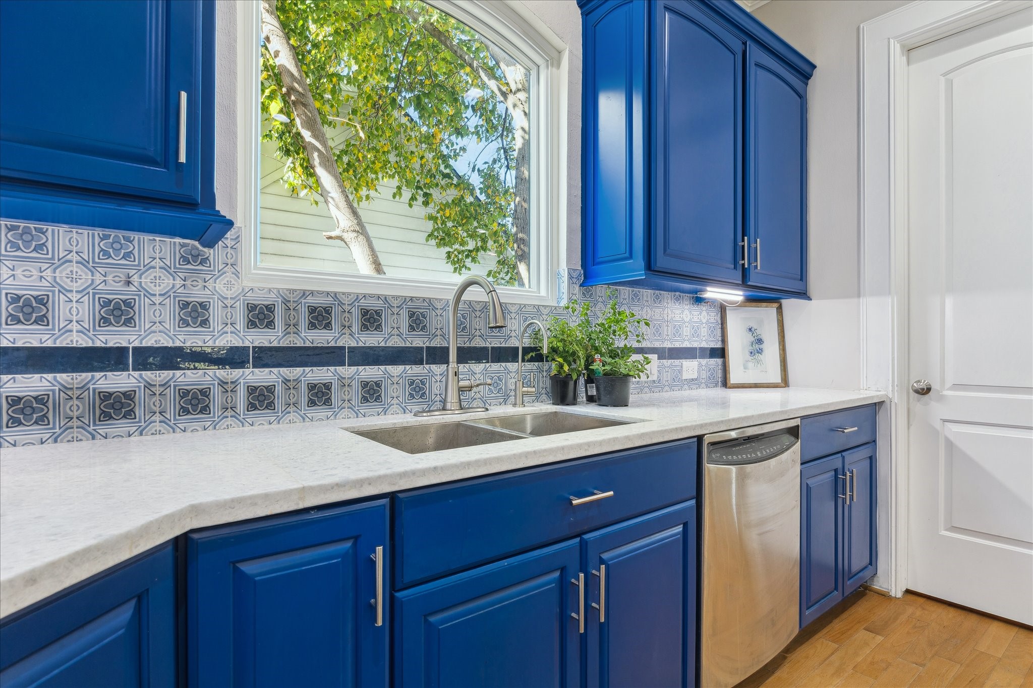 4701 Inker Street Houston, TX 77007 - Photo 20 of 45 a kitchen with a sink and cabinets