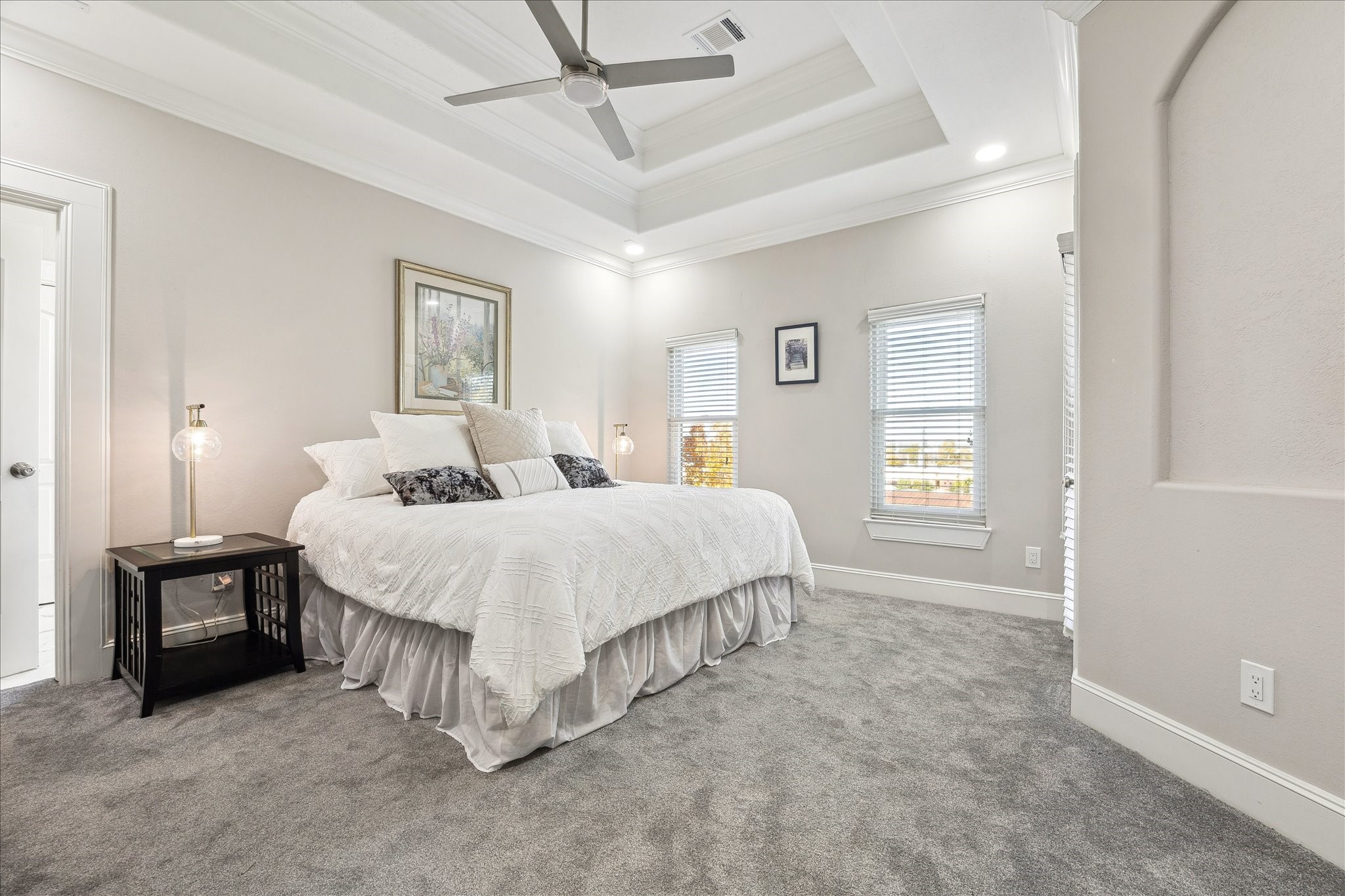 4701 Inker Street Houston, TX 77007 - Photo 26 of 45 a spacious bedroom with a bed and a window