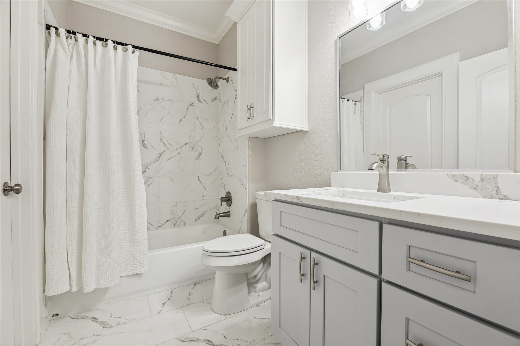 4701 Inker Street Houston, TX 77007 - Photo 35 of 45 a bathroom with a sink toilet and shower