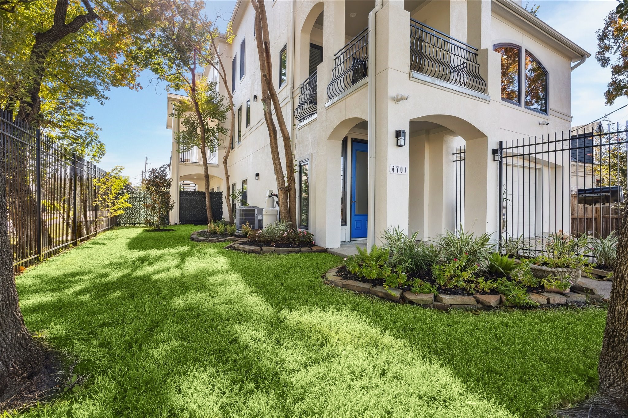 4701 Inker Street Houston, TX 77007 - Photo 43 of 45 a view of a white house with a big yard and large tree
