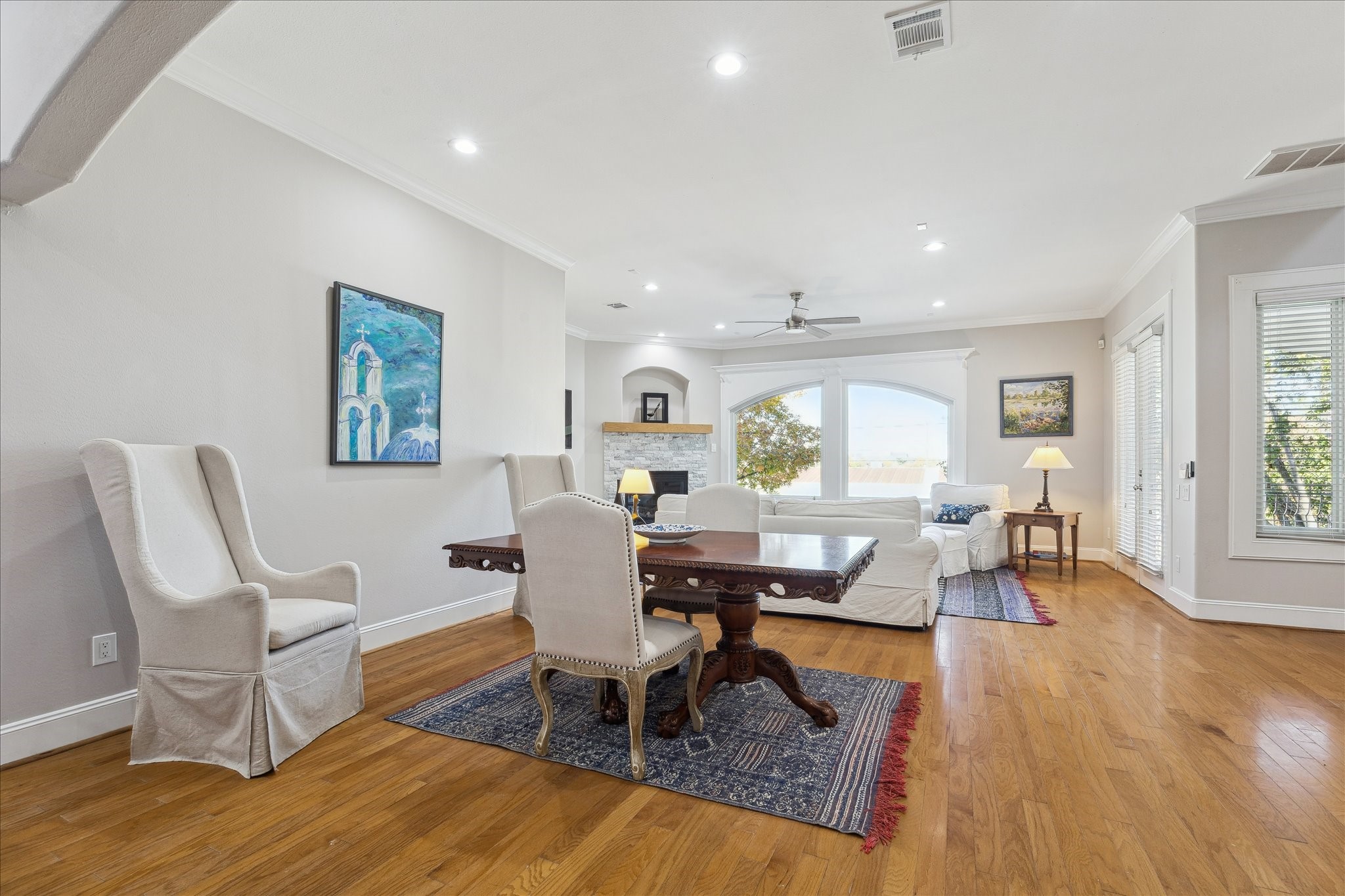 4701 Inker Street Houston, TX 77007 - Photo 8 of 45 a view of a dining room with furniture window and wooden floor