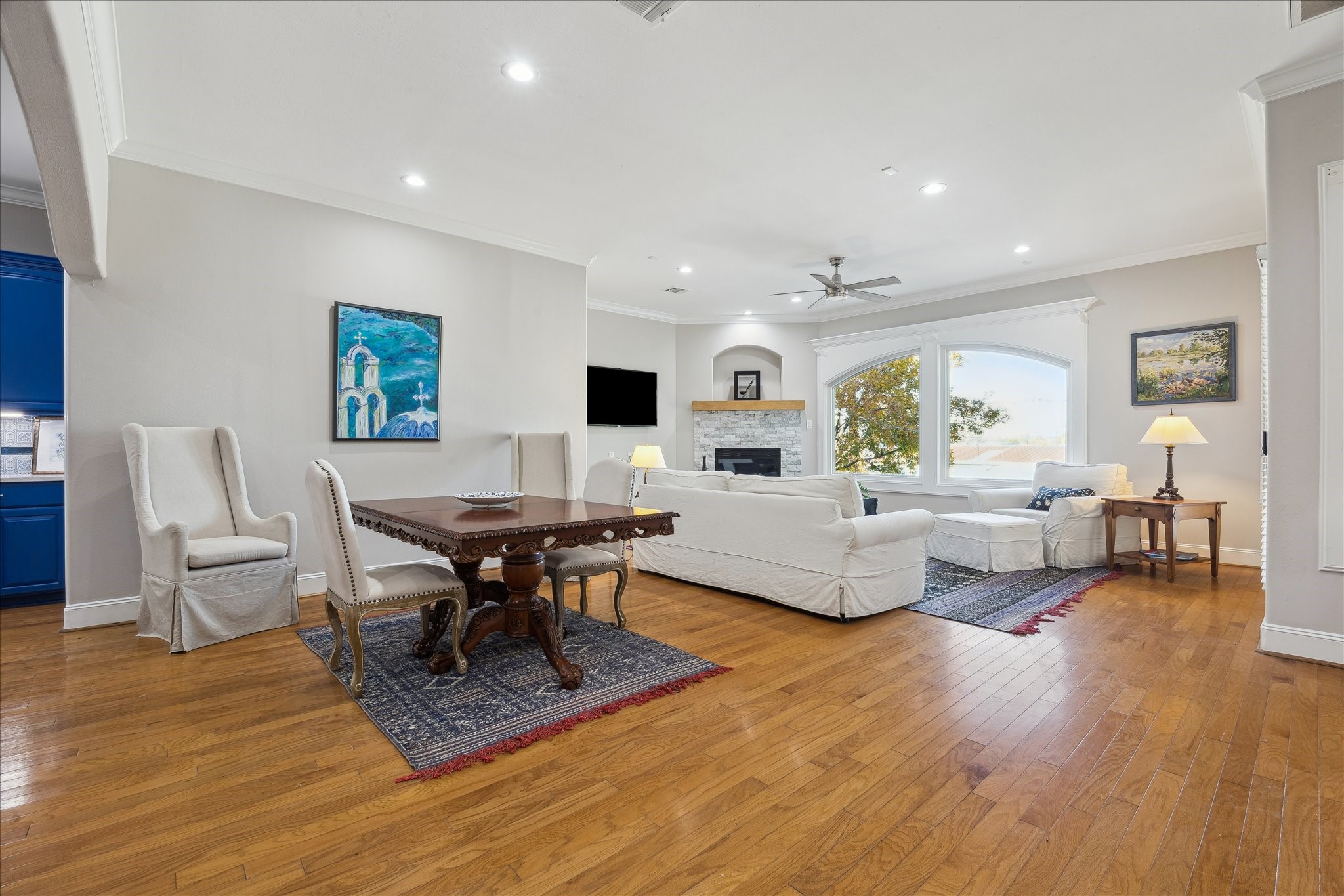 4701 Inker Street Houston, TX 77007 - Photo 9 of 45 a living room with fireplace furniture and a wooden floor