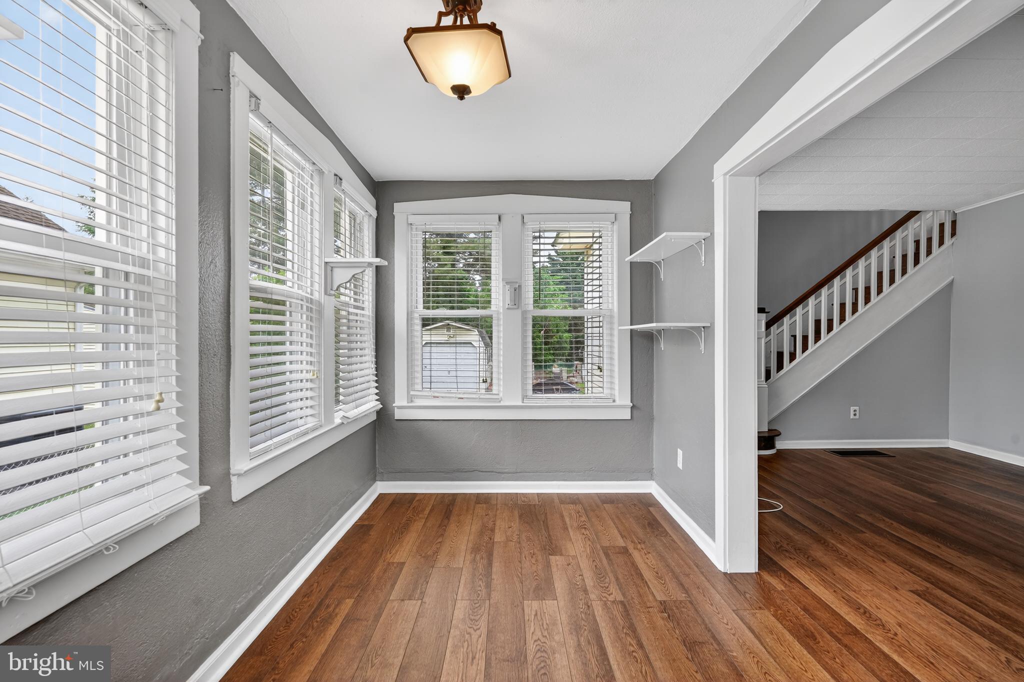 106 Ford Street Voorhees, NJ 08043 - Photo 6 of 36 a view of empty room with wooden floor and fan