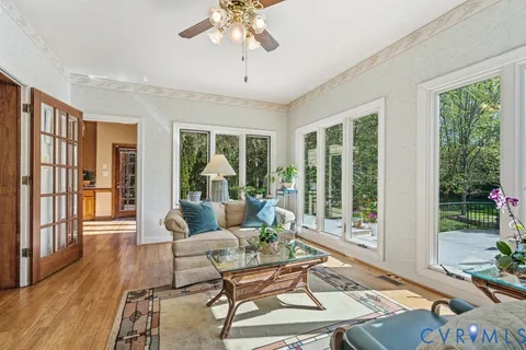 a kitchen with stainless steel appliances granite countertop a sink a stove and a microwave