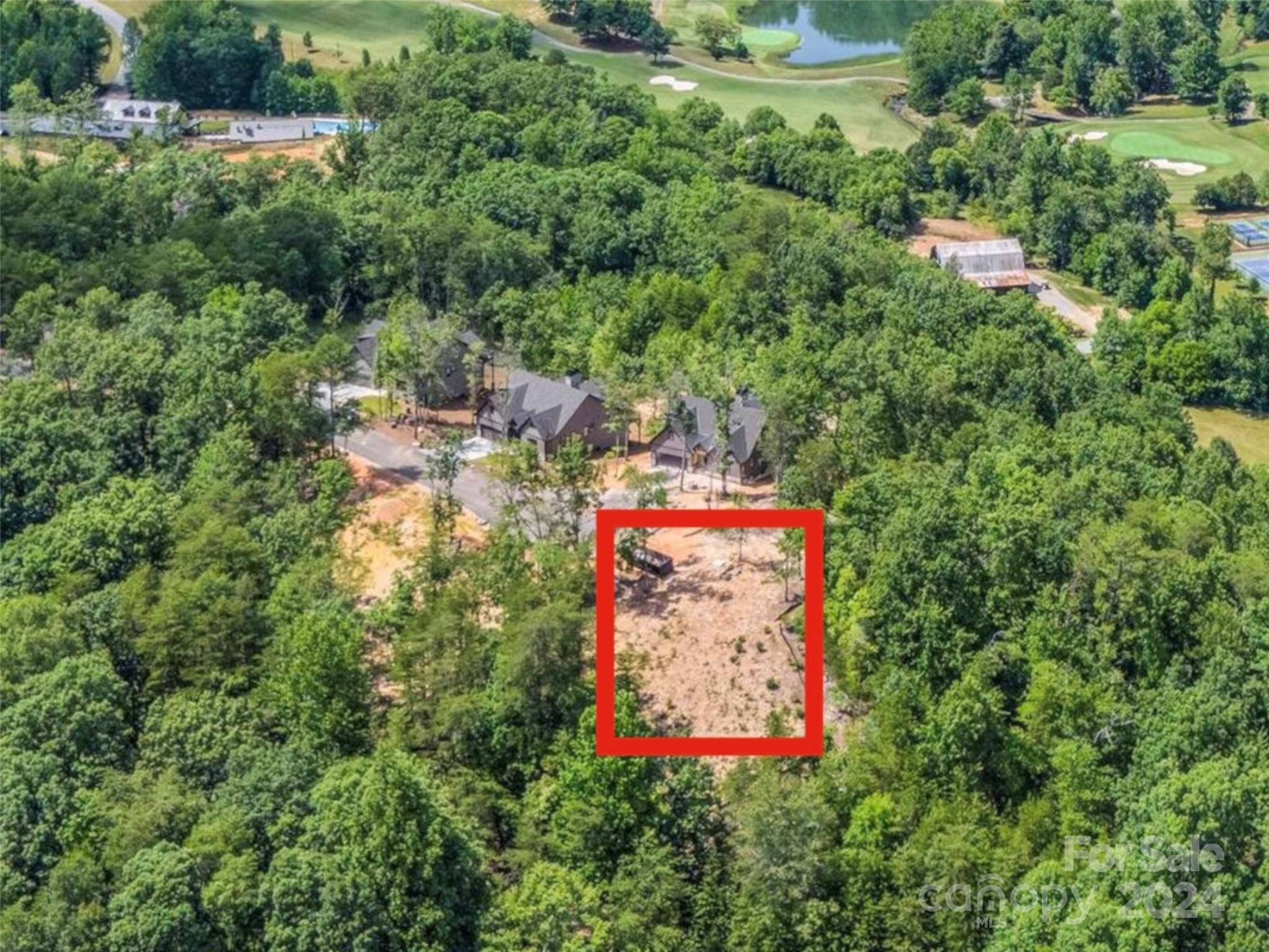7 Jackson Ridge Ln Mill Spring Mill Spring, NC 28756 - Photo 2 of 2 an aerial view of houses and roads