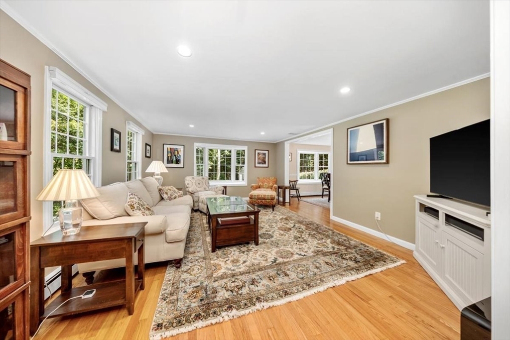198 Pine Street Norwell, MA 02061 - Photo 12 of 31 a living room with furniture and a flat screen tv