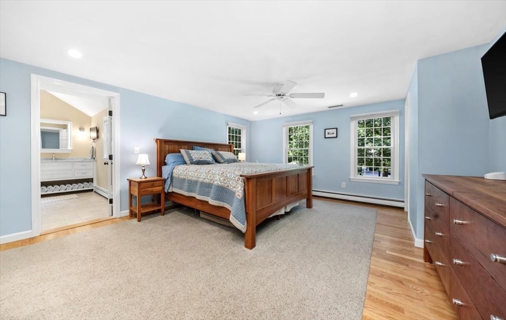 198 Pine Street Norwell, MA 02061 - Photo 15 of 31 a bedroom with a bed and a dresser