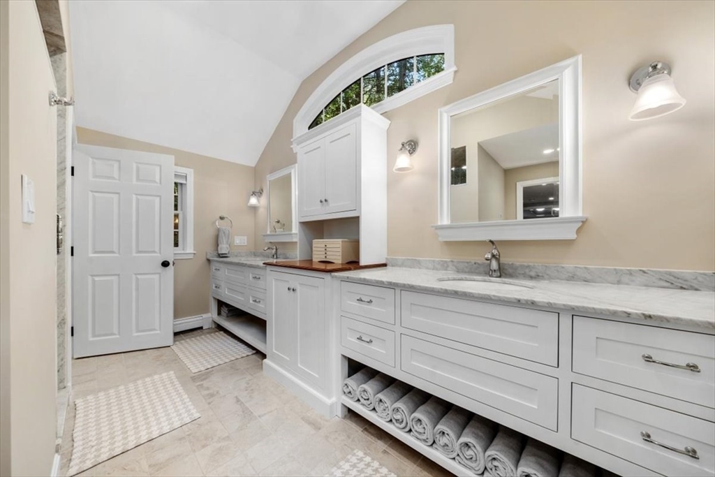 198 Pine Street Norwell, MA 02061 - Photo 16 of 31 a spacious bathroom with a double vanity sink a mirror and a