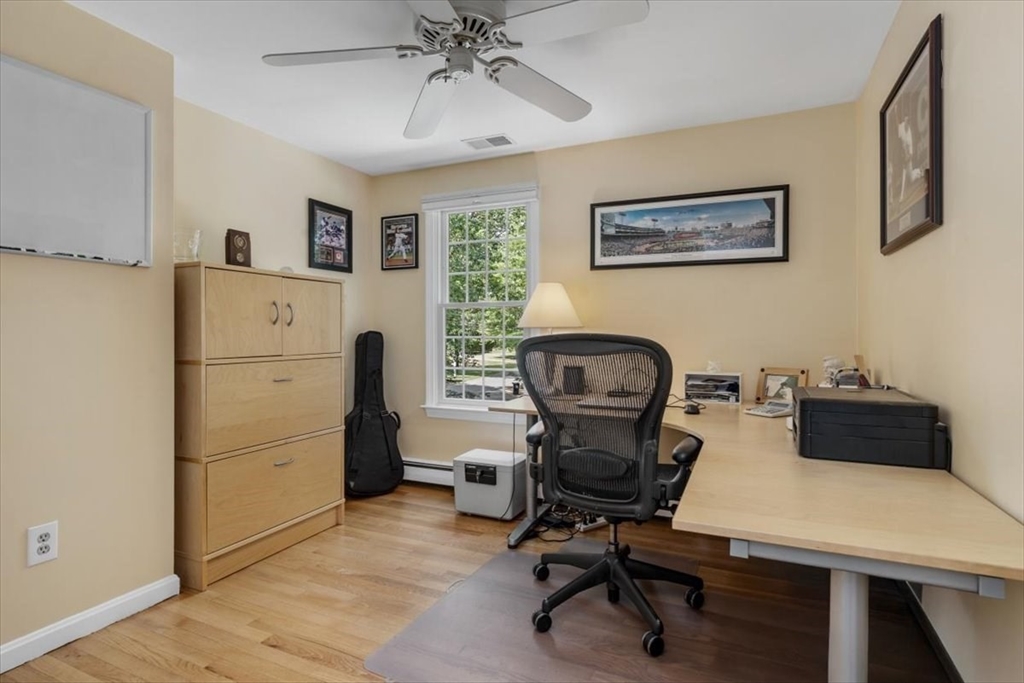 198 Pine Street Norwell, MA 02061 - Photo 21 of 31 a view of a workspace with furniture and a window