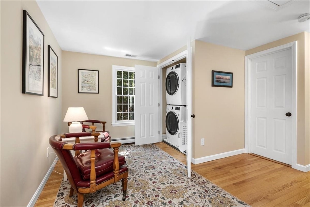 198 Pine Street Norwell, MA 02061 - Photo 22 of 31 a living room with furniture and a window