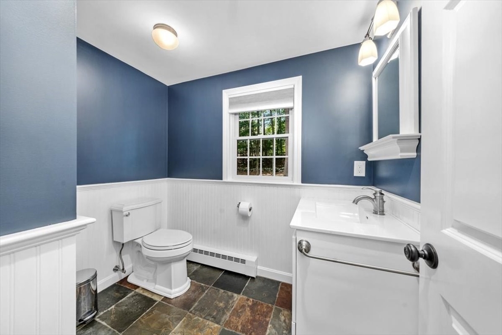 198 Pine Street Norwell, MA 02061 - Photo 10 of 31 a bathroom with a sink toilet and a mirror