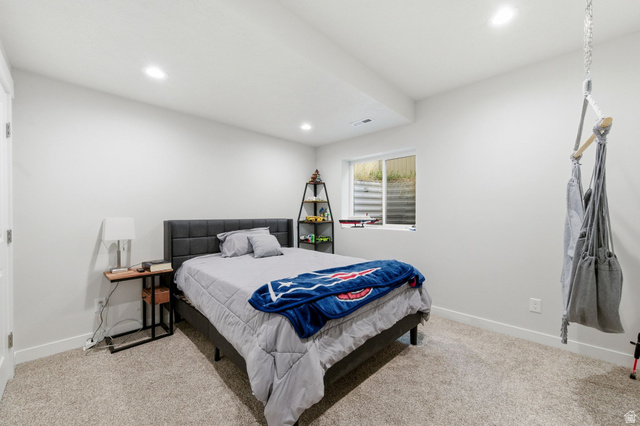 1038 South Old Towne Road Layton, UT 84041 - Photo 26 of 39 Carpeted room featuring a single window, white walls, and recessed lighting