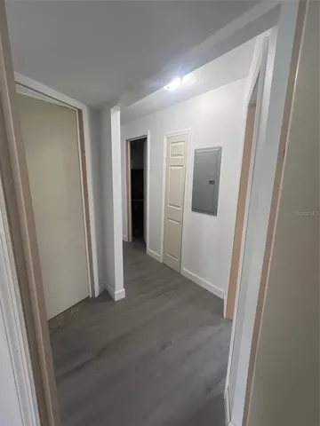 a view of entryway with wooden floor