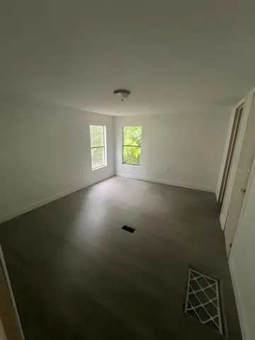 an empty room with windows