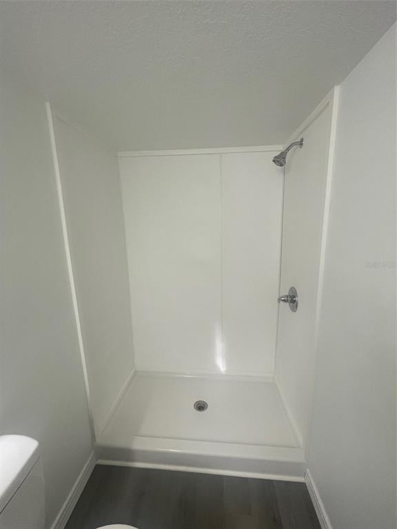 1001 Northeast 77th Street, Unit 3 Ocala, FL 34479 - Photo 10 of 20 a bathroom with a shower