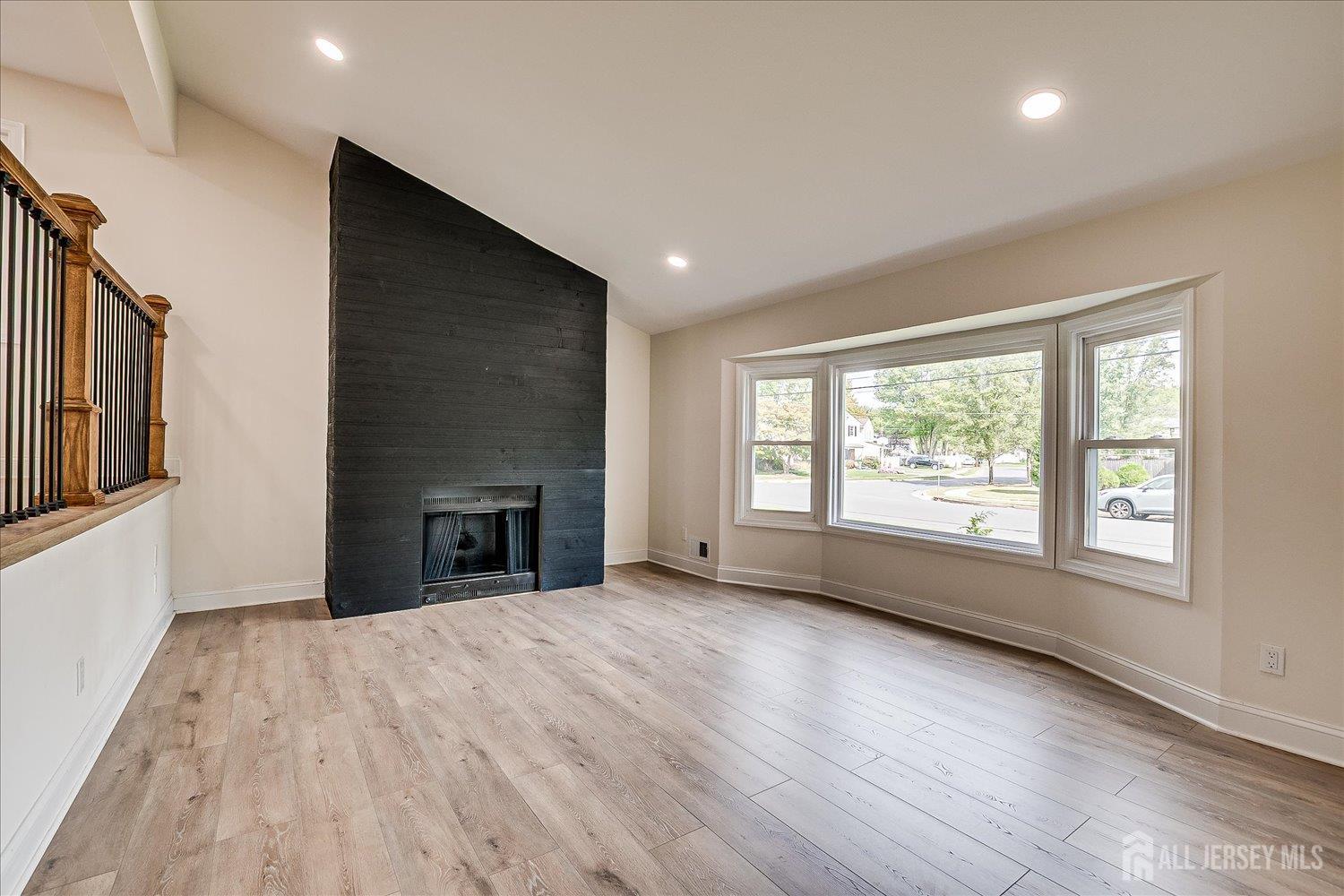 21 Lydia Lane Edison, NJ 08817 - Photo 17 of 49 a view of an empty room with a window and fireplace