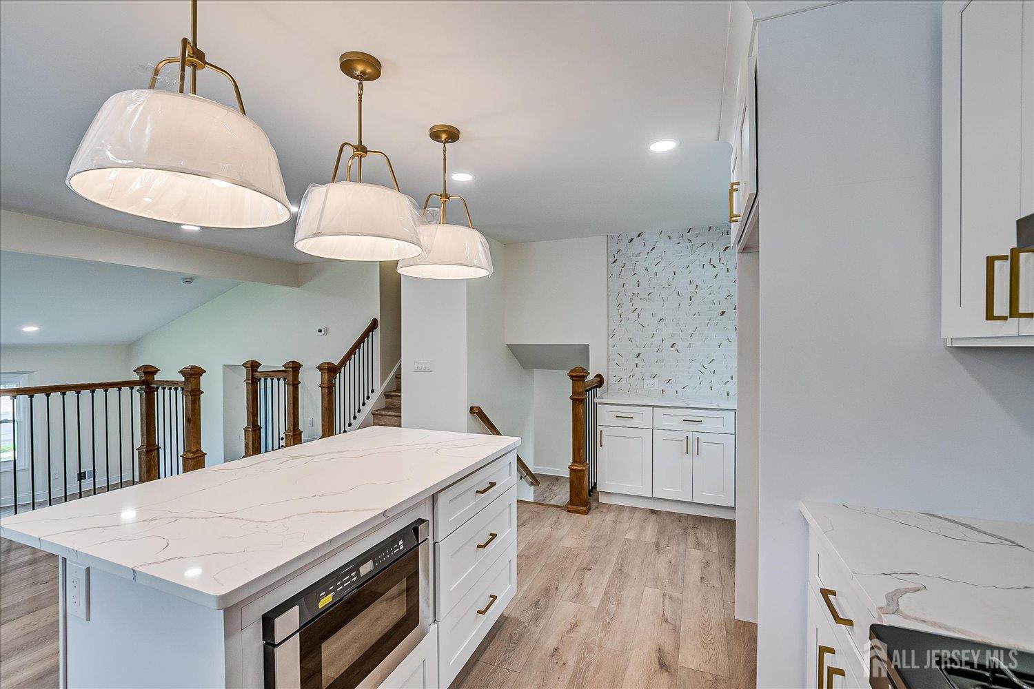 21 Lydia Lane Edison, NJ 08817 - Photo 24 of 49 a kitchen that has a lot of cabinets in it
