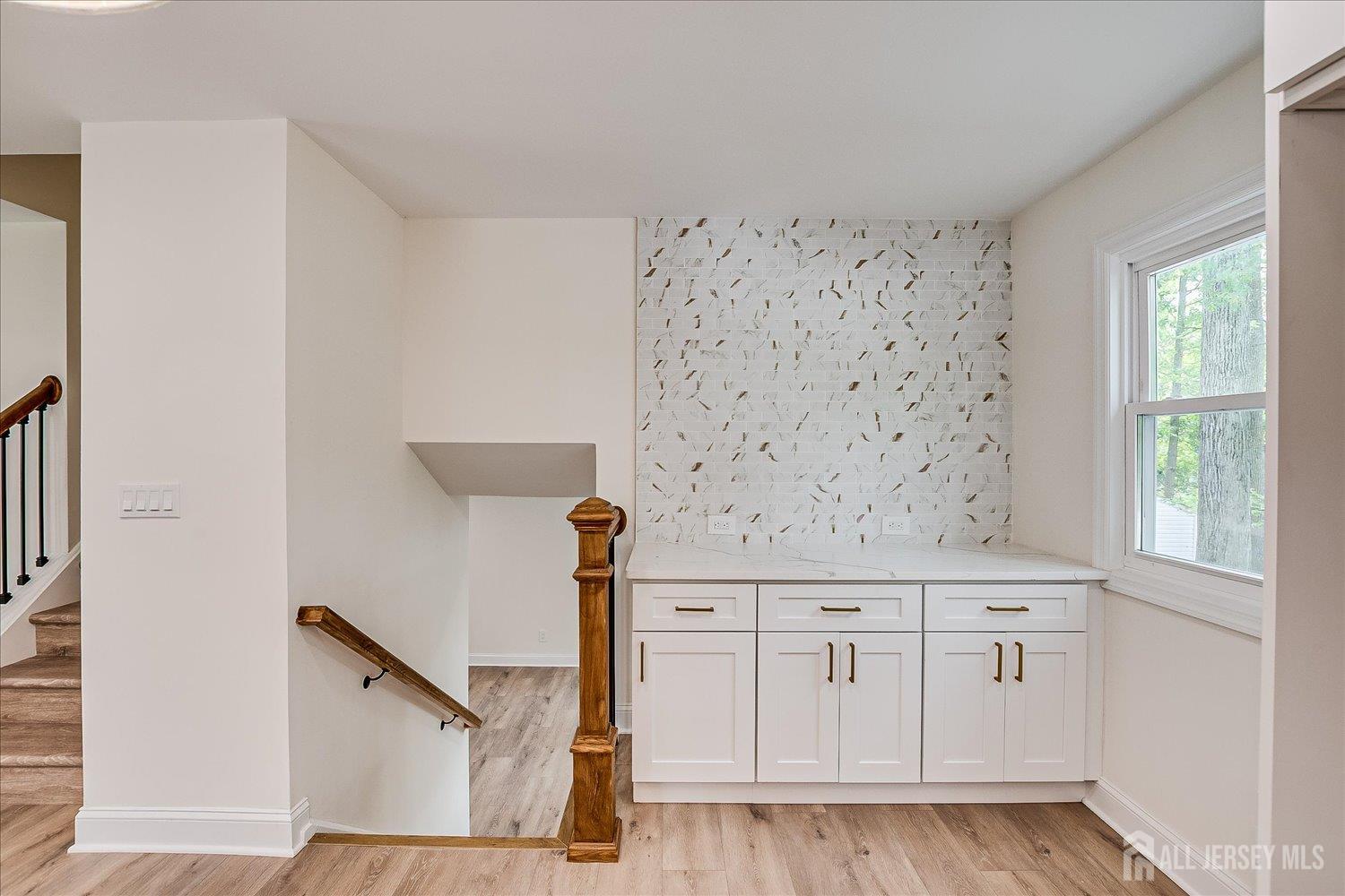 21 Lydia Lane Edison, NJ 08817 - Photo 26 of 49 a view of a kitchen with white cabinets
