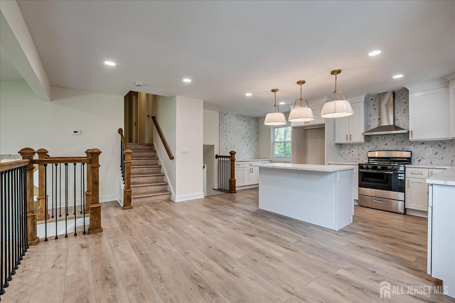21 Lydia Lane Edison, NJ 08817 - Photo 28 of 49 a view of kitchen with wooden floor and electronic appliances