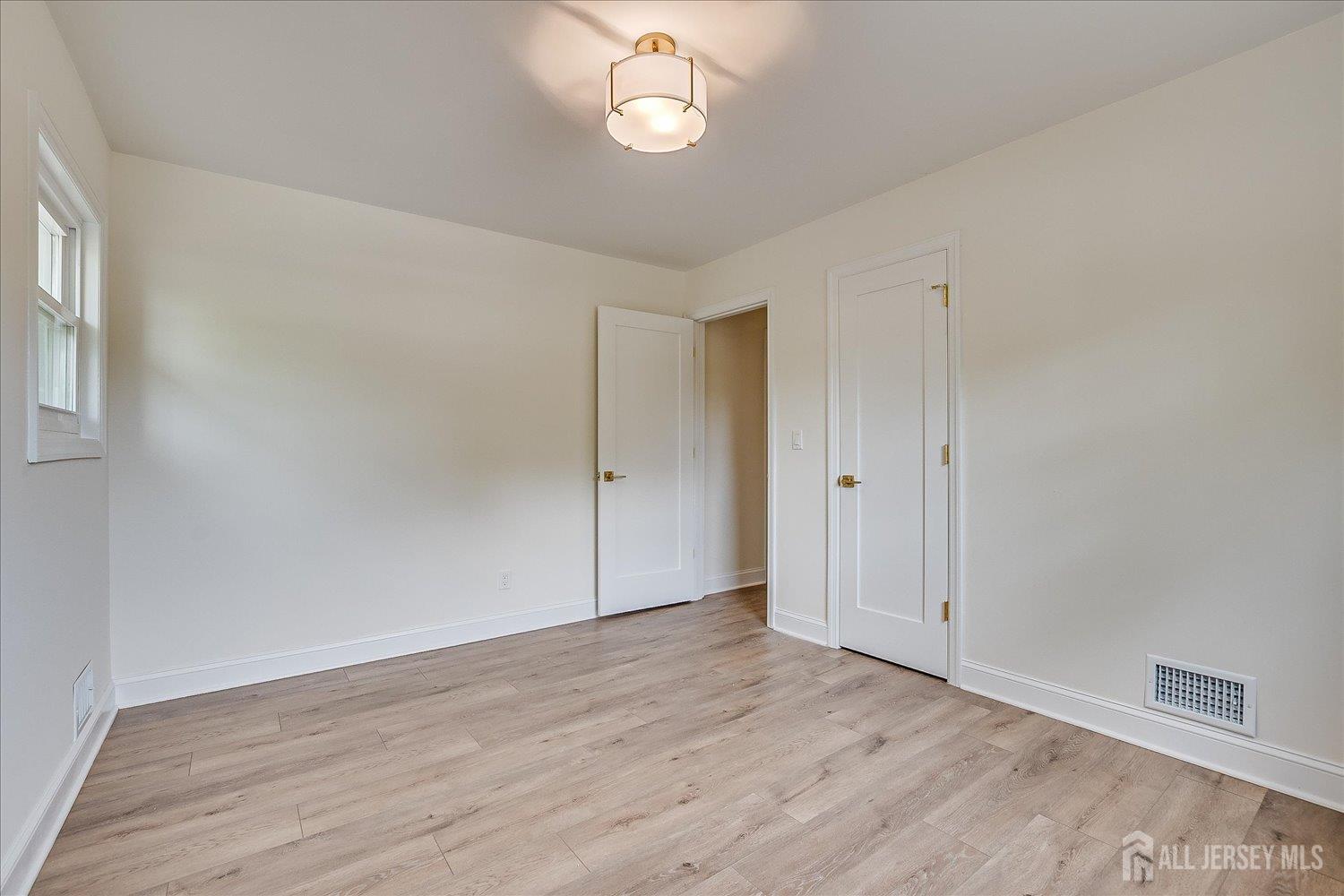 21 Lydia Lane Edison, NJ 08817 - Photo 35 of 49 wooden floor in an empty room