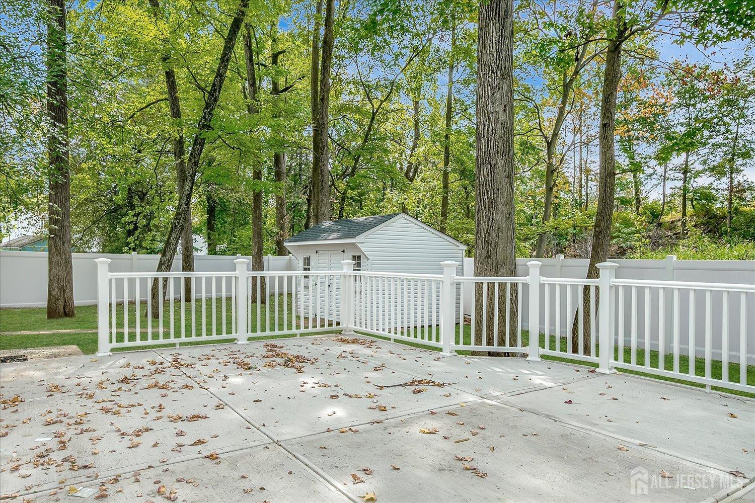 21 Lydia Lane Edison, NJ 08817 - Photo 42 of 49 a view of a house with a small yard