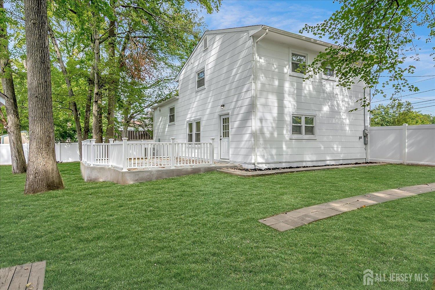 21 Lydia Lane Edison, NJ 08817 - Photo 43 of 49 a view of a house with a yard