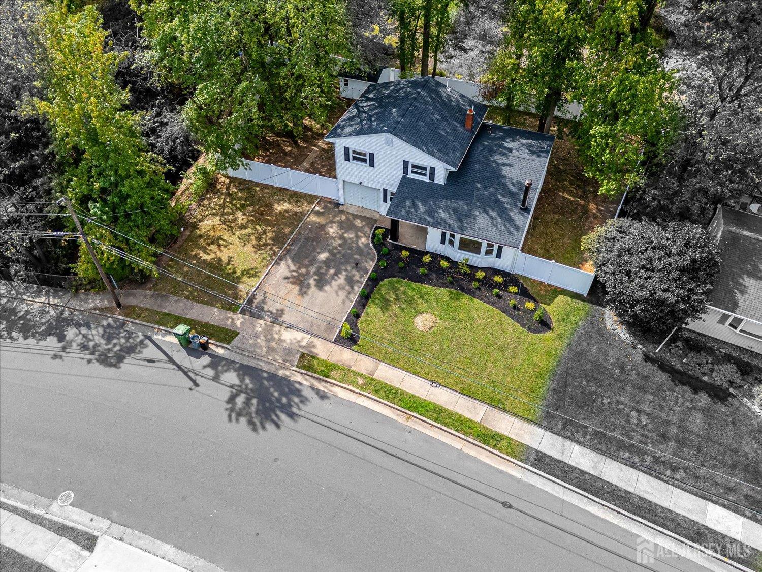 21 Lydia Lane Edison, NJ 08817 - Photo 5 of 49 an aerial view of house with yard
