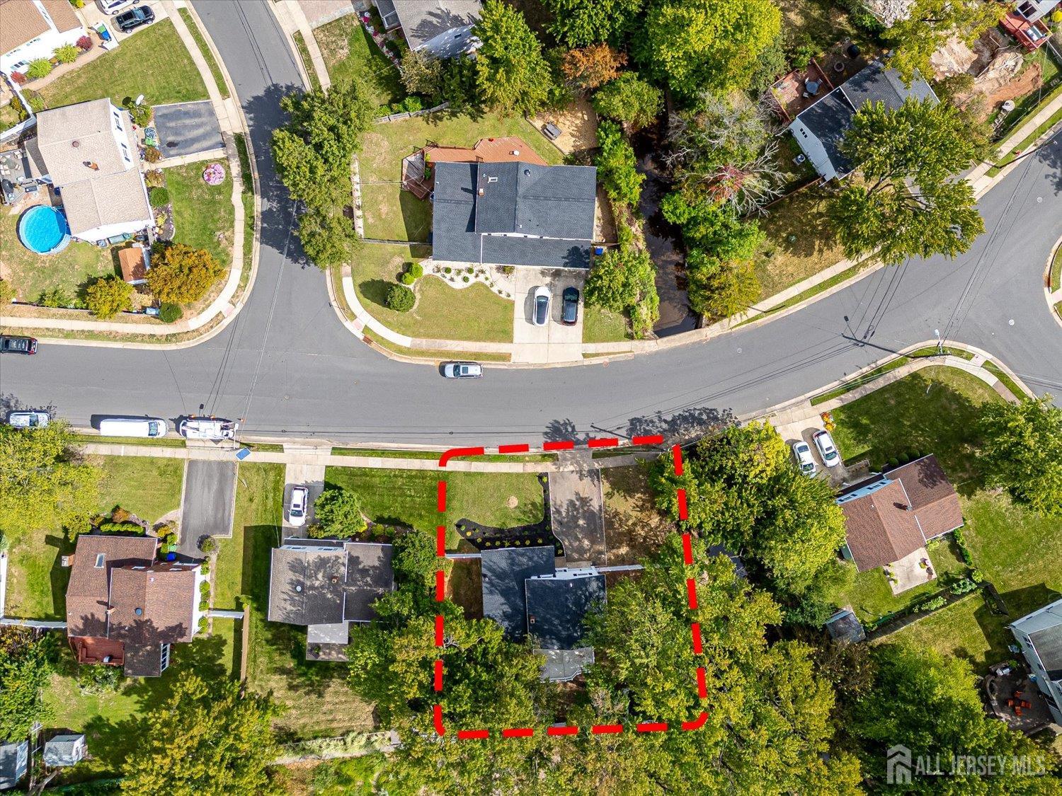 21 Lydia Lane Edison, NJ 08817 - Photo 8 of 49 an outdoor space with lots of flower plants