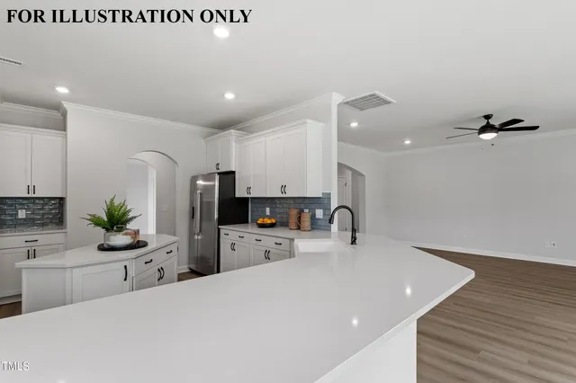 a view of an empty room with a fireplace