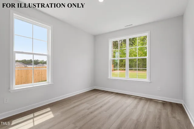 an empty room with windows