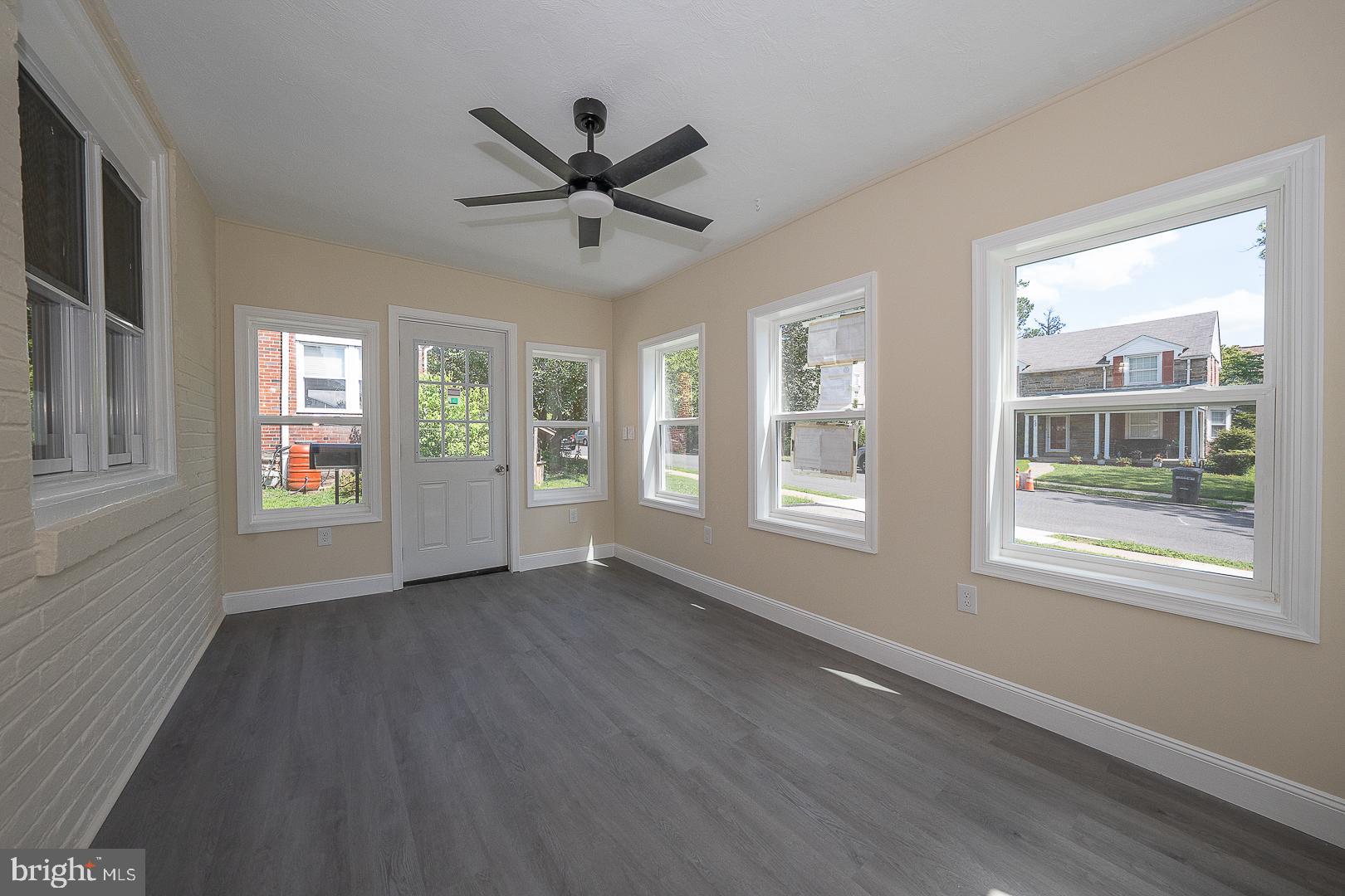 632 Merion Avenue Upper Darby, PA 19082 - Photo 77 of 84 a view of an empty room with a window and wooden floor