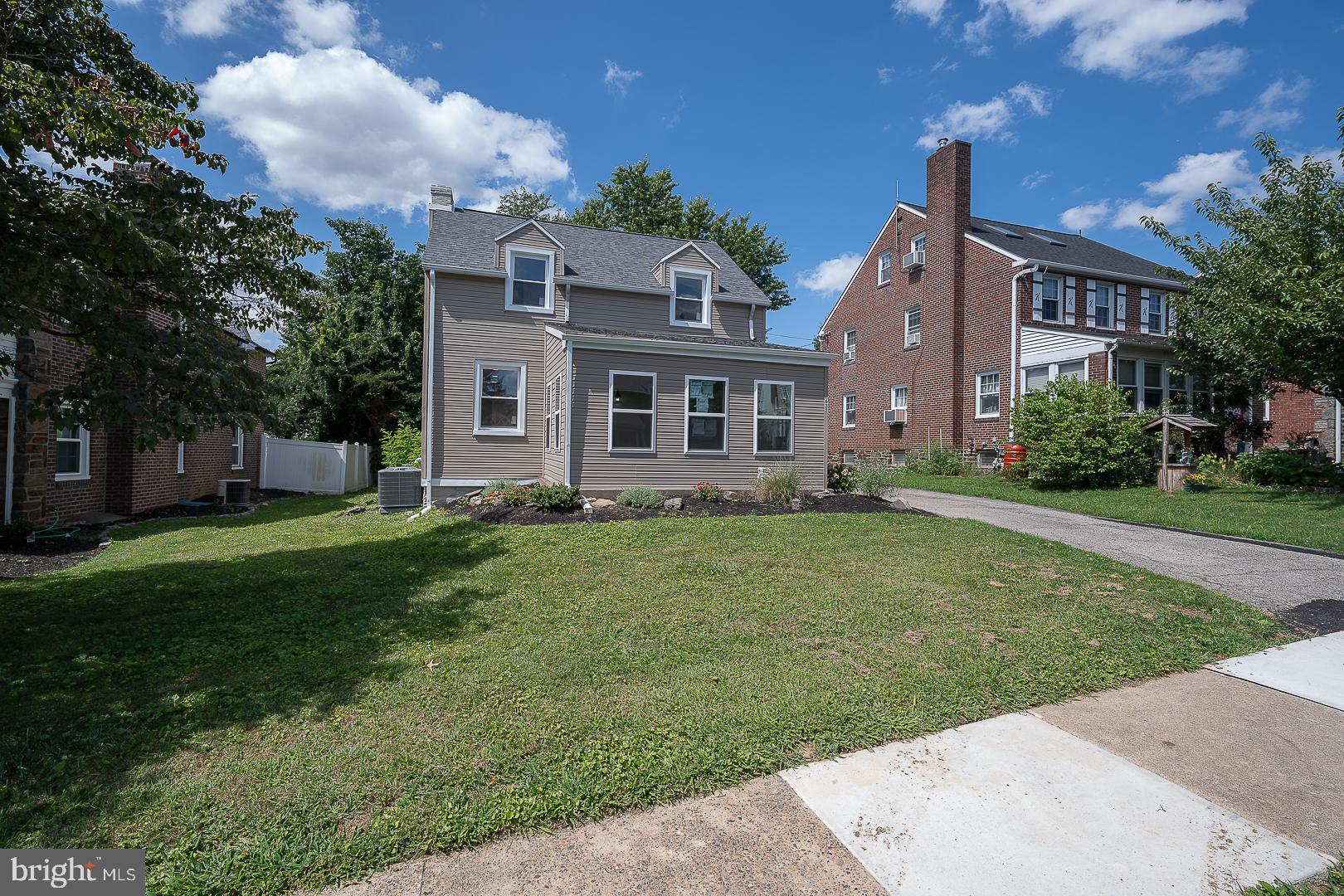 632 Merion Avenue Upper Darby, PA 19082 - Photo 80 of 84 a front view of a house with a garden and plants
