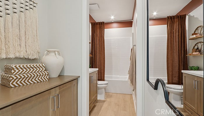 18318 Mystic Court Riverside, CA 92508 - Photo 14 of 47 a bathroom with a sink toilet and shower