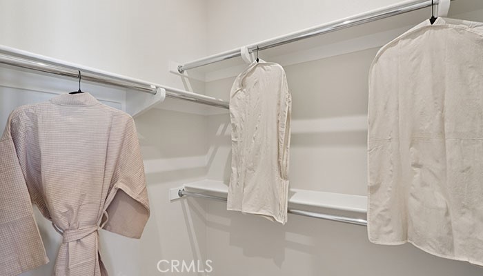 18318 Mystic Court Riverside, CA 92508 - Photo 16 of 47 a bathroom with a glass shower door and a bathtub