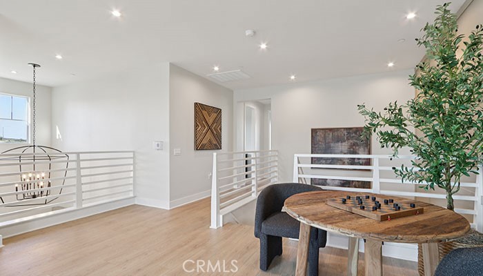 18318 Mystic Court Riverside, CA 92508 - Photo 34 of 47 a kitchen with stainless steel appliances granite countertop a sink and a refrigerator