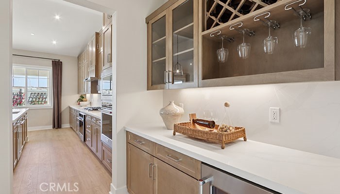 18318 Mystic Court Riverside, CA 92508 - Photo 37 of 47 a kitchen with a sink and a stove top oven