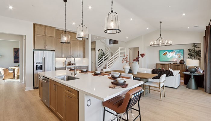 18318 Mystic Court Riverside, CA 92508 - Photo 42 of 47 a large kitchen with a table and chairs