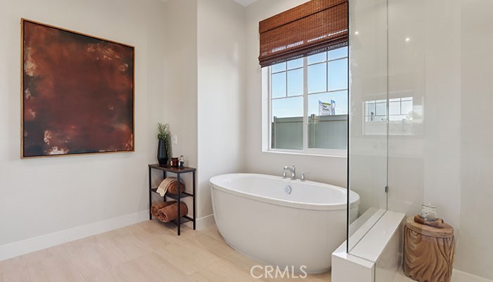 18318 Mystic Court Riverside, CA 92508 - Photo 4 of 47 a white bath tub sitting next to a bathroom