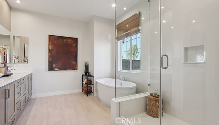 18318 Mystic Court Riverside, CA 92508 - Photo 7 of 47 a bathroom with a tub sink and mirror
