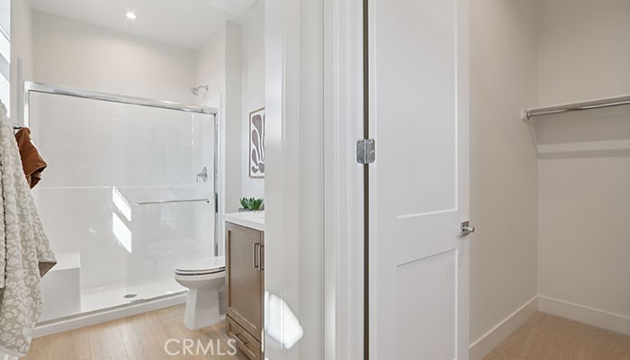 18318 Mystic Court Riverside, CA 92508 - Photo 8 of 47 a bathroom with a toilet and a shower