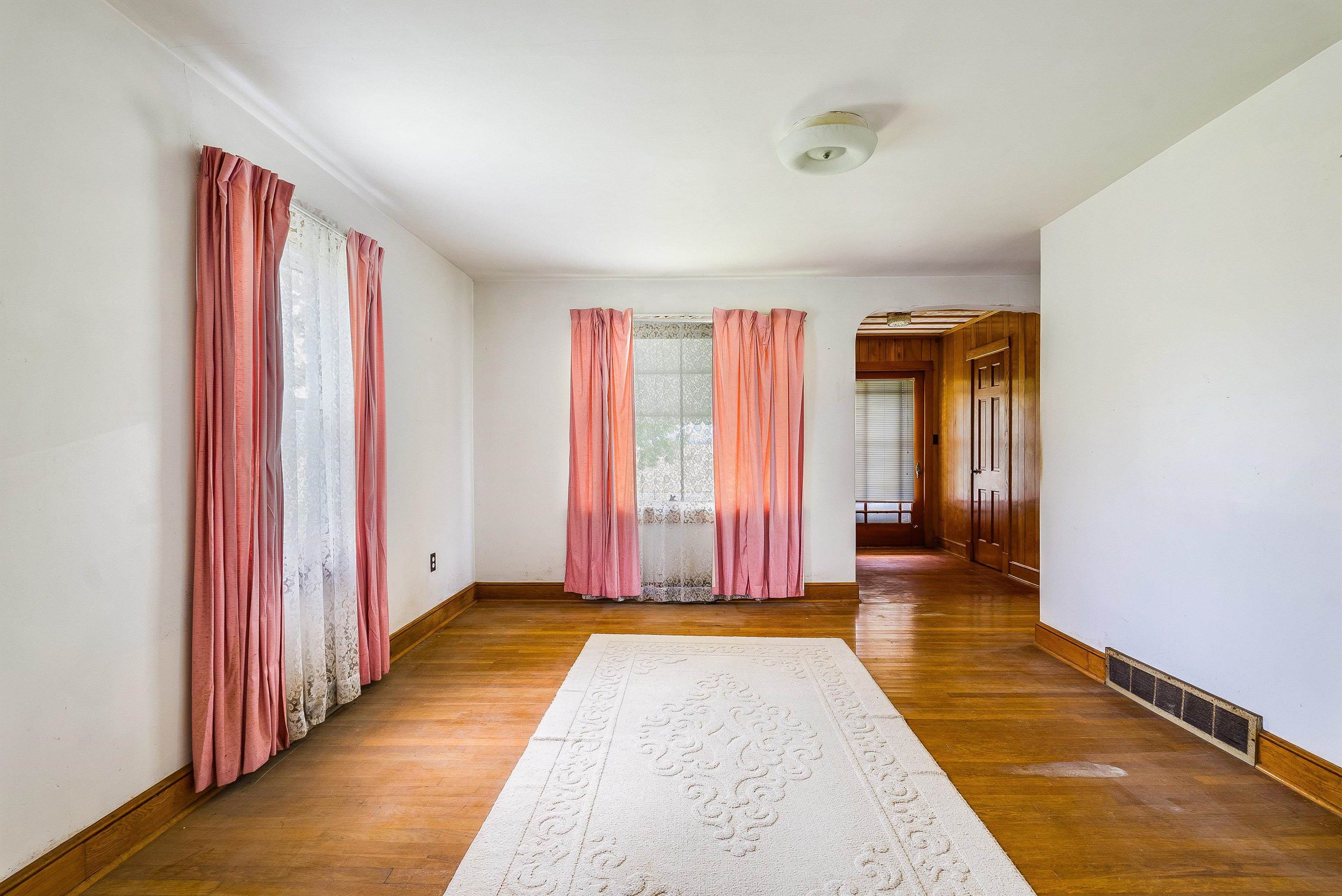 6507 East Point Road Elkton, VA 22827 - Photo 15 of 39 a view of a room with wooden floor and chair